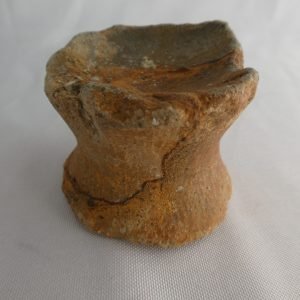 Japanese ancient clay bottom of a pot 3000 years old. Notice comb marks at bottom area.