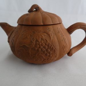 Chinese lobulated clay tea pot. Signed.