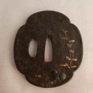Japanese Tsuba (Sword Guard) featuring a rabbit and flowers in gold and silver inlay, Edo period, Nihonto