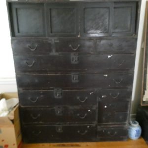 Japanese Edo period. Large tansu sliding panels at top. 13 drawers separates into two pieces.