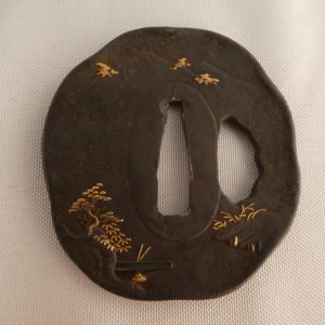 Japanese Tsuba (Sword Guard) featuring a pine tree and birds in flight in gold. Edo period. Nihonto.